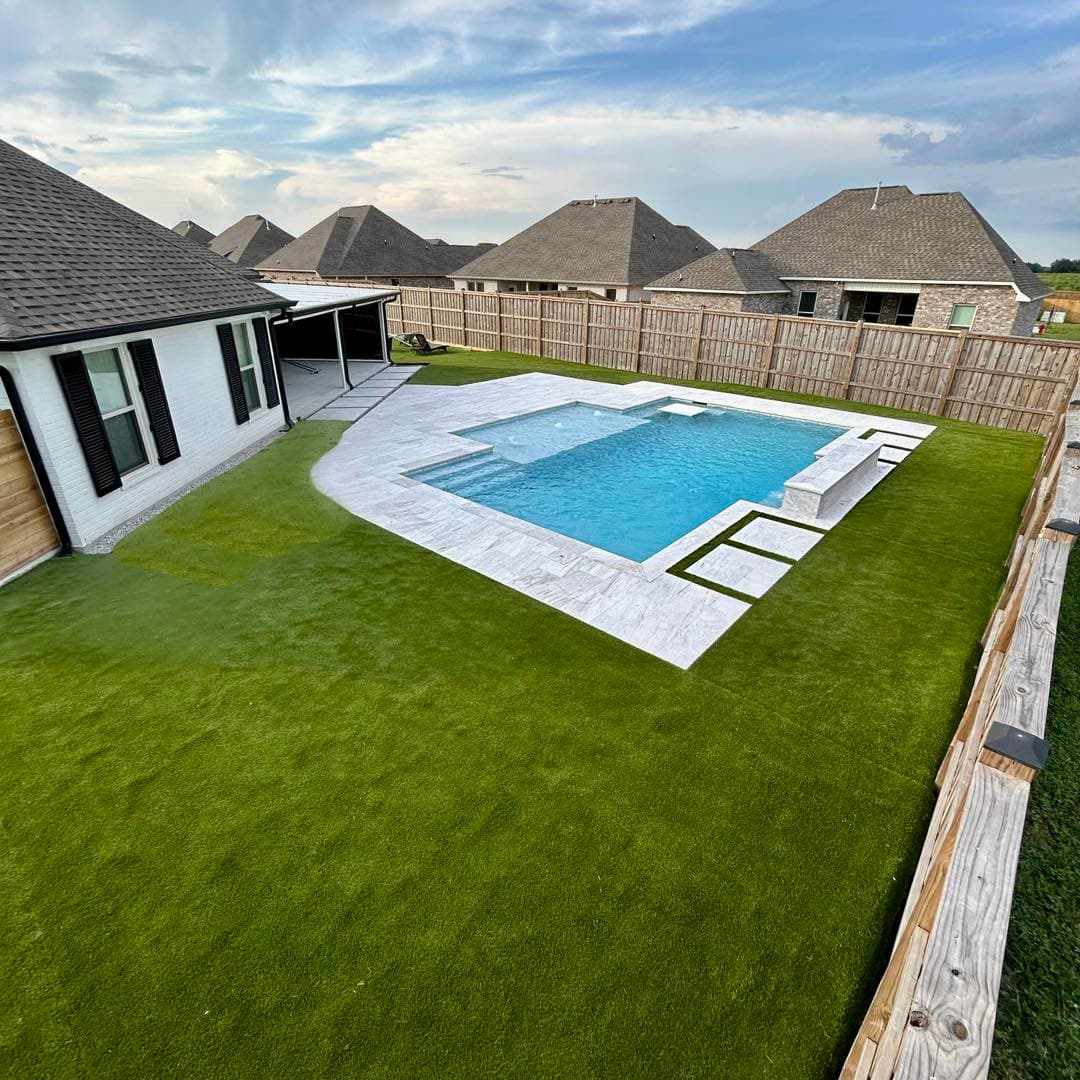 Aerial view of pool with artificial turf